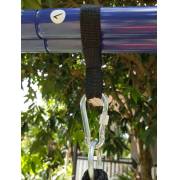 Mini strap looped over the swing set stand bar with a carabiner